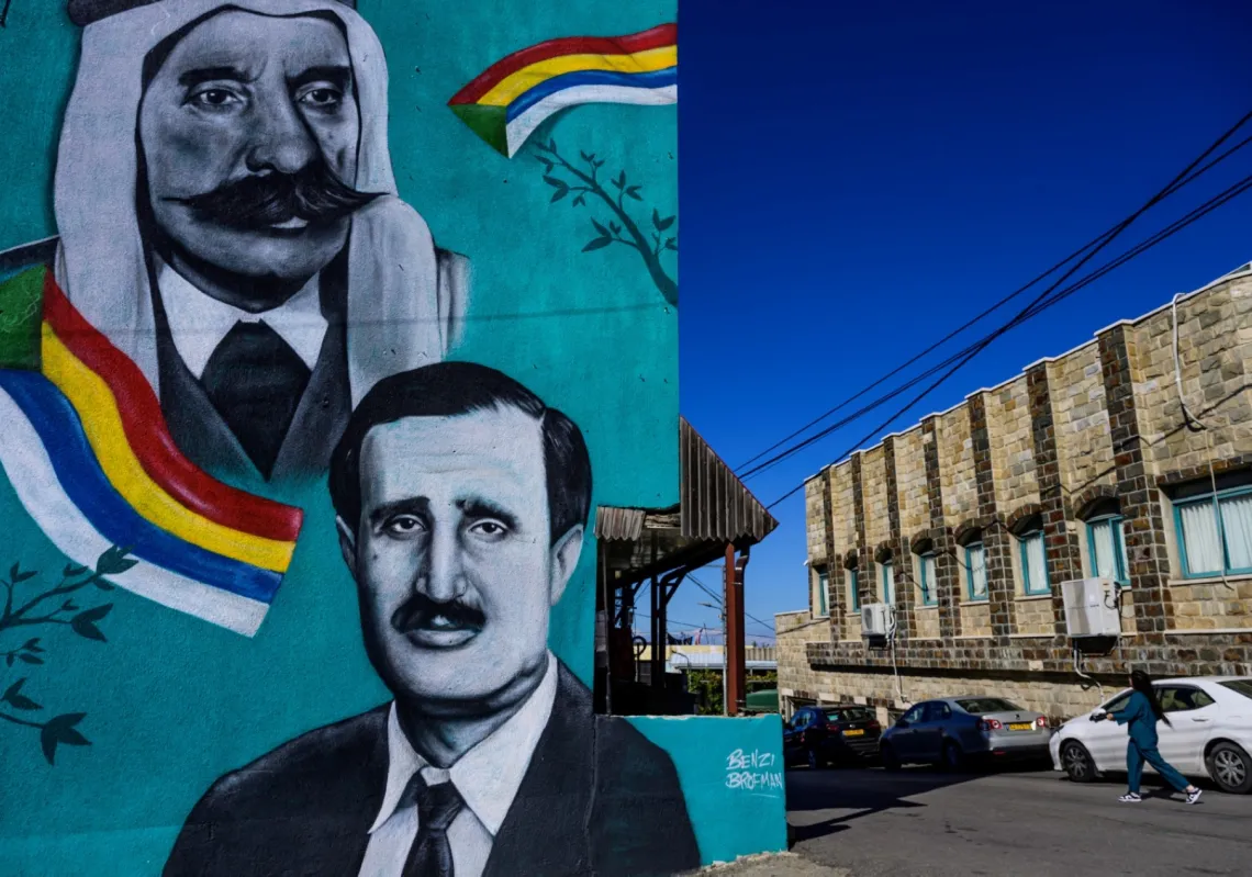 a mural depicting Lebanese Druze politician Walid Jumblatt (bottom, R) and Syrian Druze nationalist leader Sultan al-Atrash, in the predominantly Druze city of Beit Jann on November 16, 2023.