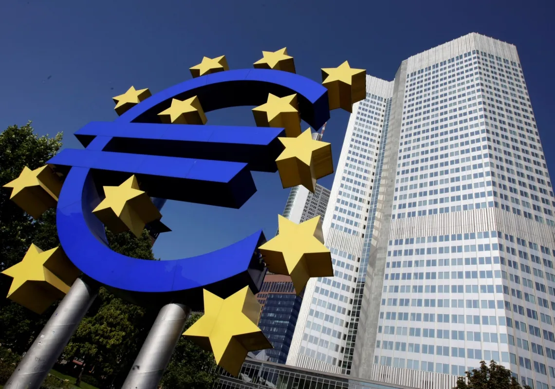 A model of the euro in front of the European Central Bank headquarters in Frankfurt, Germany.