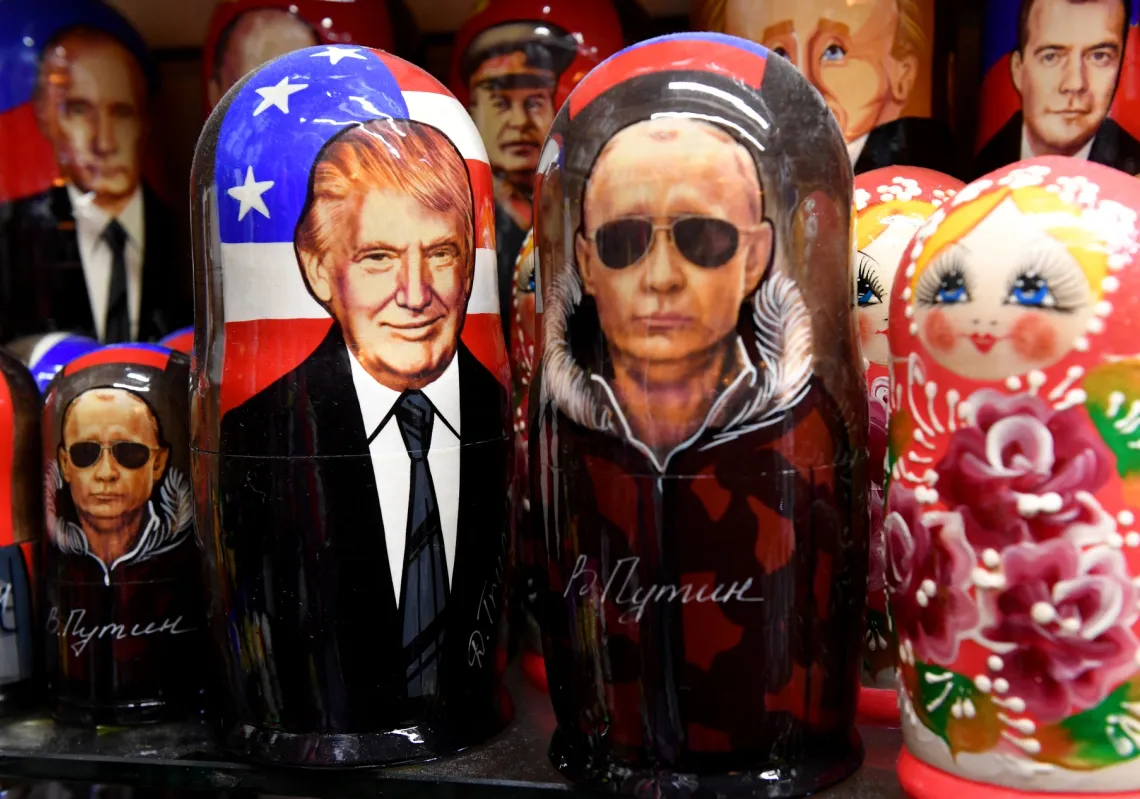 Traditional Russian wooden nesting dolls, Matryoshka dolls, depicting Russia&#039;s President Vladimir Putin and US President Donald Trump are displayed for sale in Saint Petersburg on August 7, 2025.