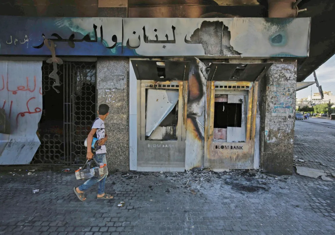 A destroyed Lebanese bank after it was set on fire by protesters, Tripoli, June 12, 2020.