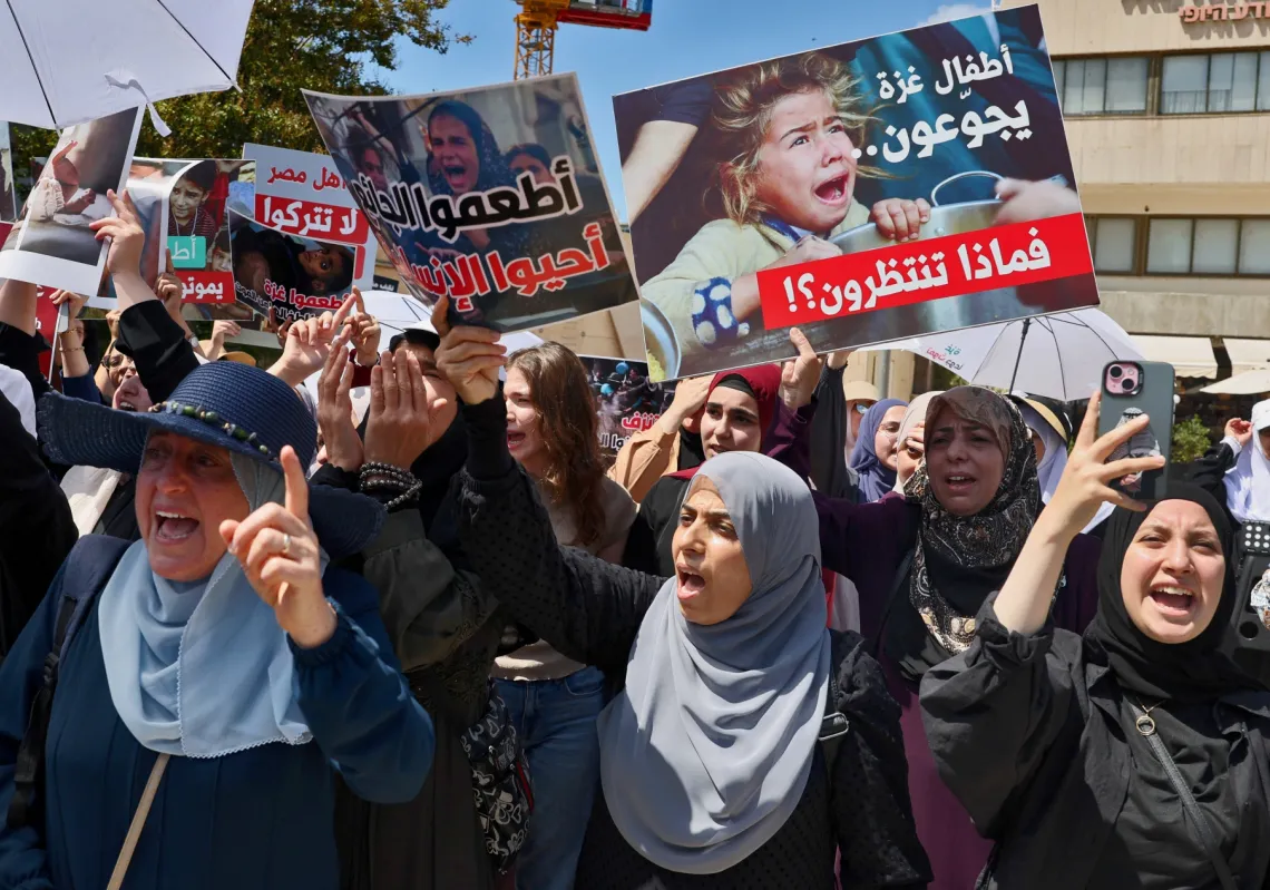 Palestinian citizens of Israel protest near the Egyptian embassy in Tel Aviv, against the closure of the Rafah crossing and the catastrophic humanitarian situation in the Gaza Strip on July 31, 2025.