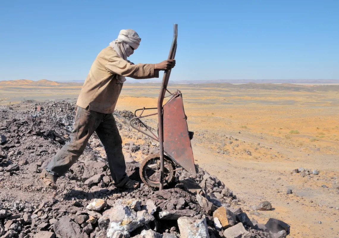 A worker mining lead sulphide in the border area between Morocco and Algeria.