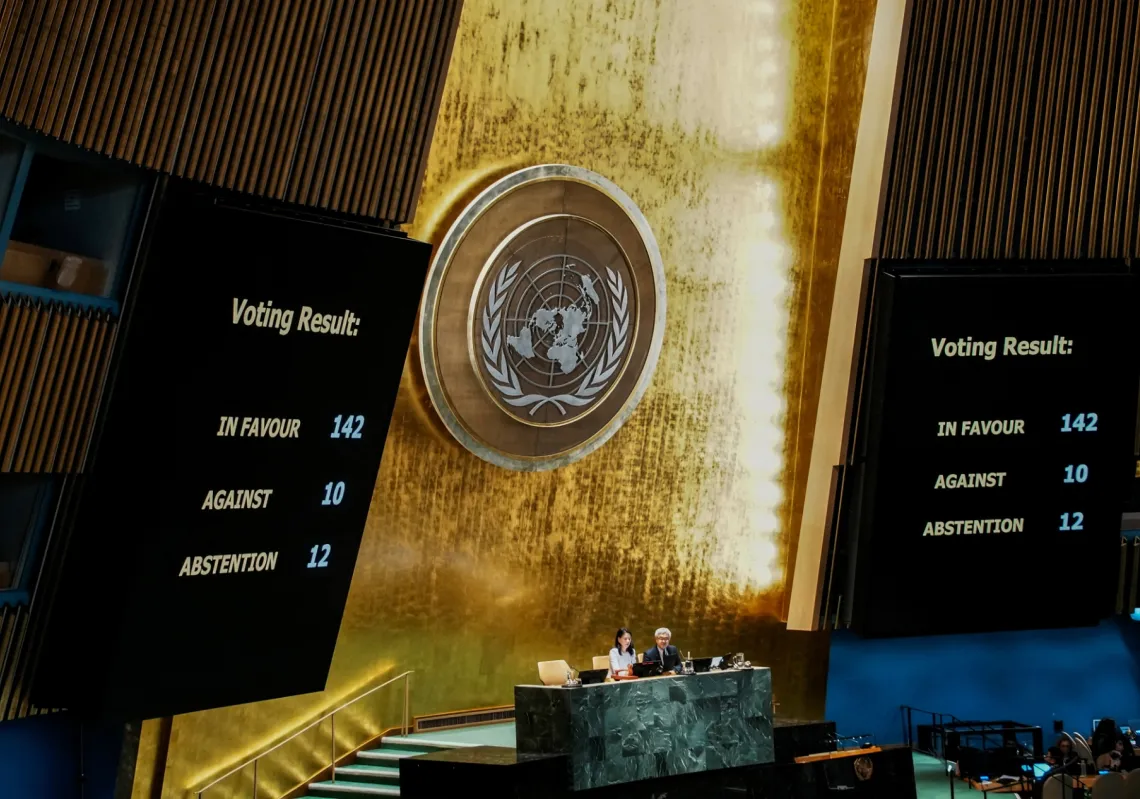 Screens show the number of votes as members of the United Nations General Assembly vote on the Palestinian issue and the implementation of the two-state solution, at the UN headquarters in New York on September 12, 2025.