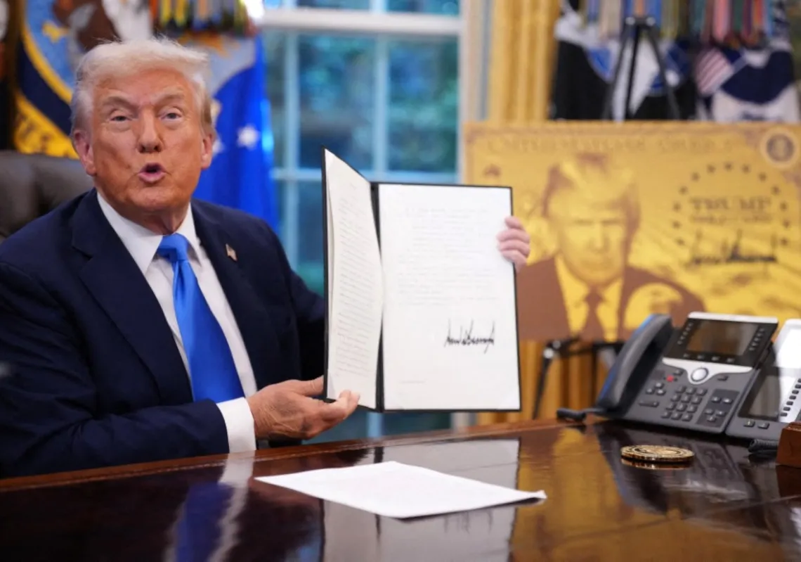President Donald Trump signed a series of executive orders establishing the  “Trump Gold Card” and introducing a $100,000 fee for H-1B visas on September 19, 2025, in Washington, DC.