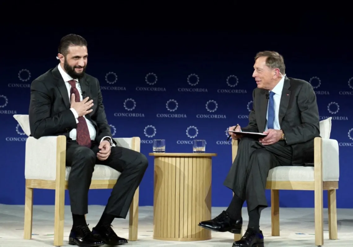 Ahmed al-Sharaa, President of the Syrian Arab Republic, and General David H. Petraeus (US Army, Ret.) speak onstage during the 2025 Concordia Annual Summit at Sheraton New York Times Square on September 22, 2025.
