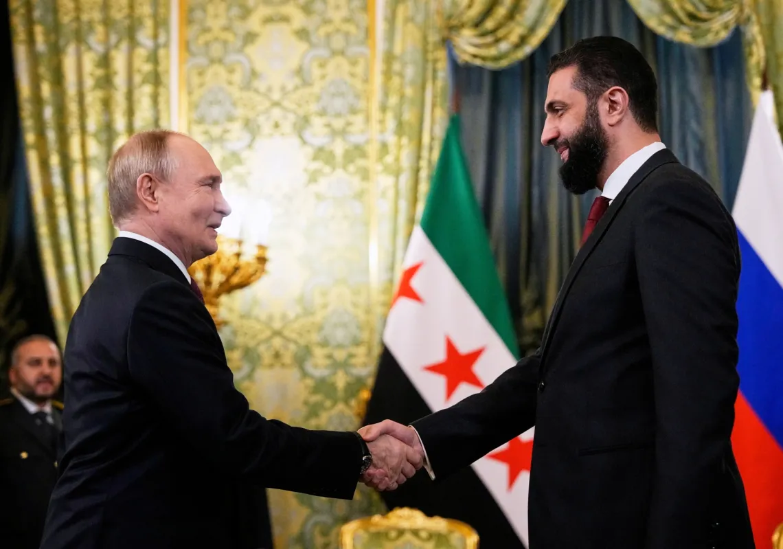 Russian President Vladimir Putin and Syrian interim president Ahmed al-Sharaa hold a meeting at the Grand Kremlin Palace in Moscow on October 15, 2025.