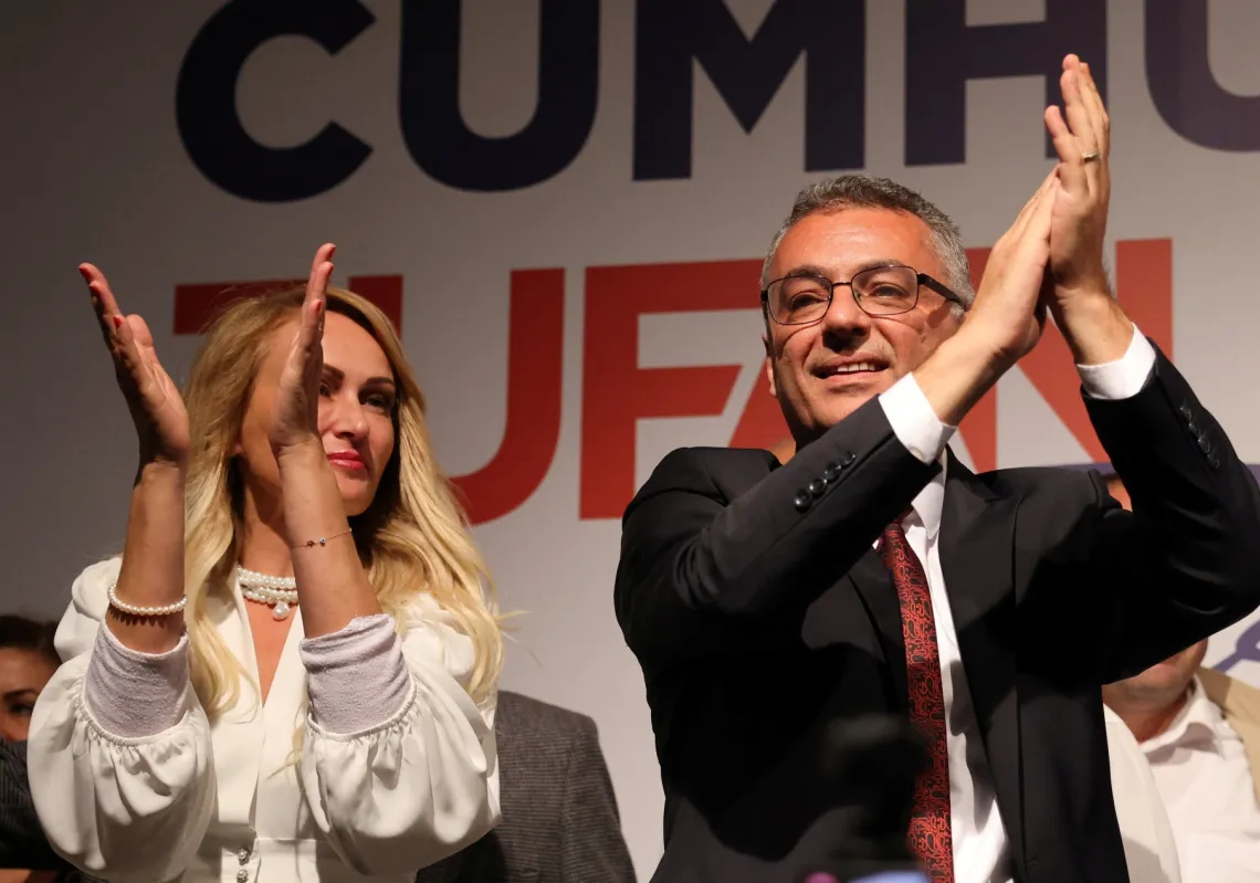 New Turkish Cypriot leader Tufan Erhürman and his wife Nilden Bektas Erhürman celebrate his victory in the Turkish Cypriot presidential election, in the capital Nicosia, Cyprus, on October 19, 2025.