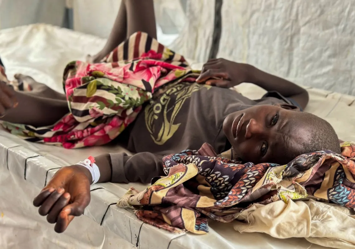 A child infected with cholera receives treatment in the cholera isolation centre at the refugee camps of western Sudan, in Tawila city in Darfur, on August 12, 2025