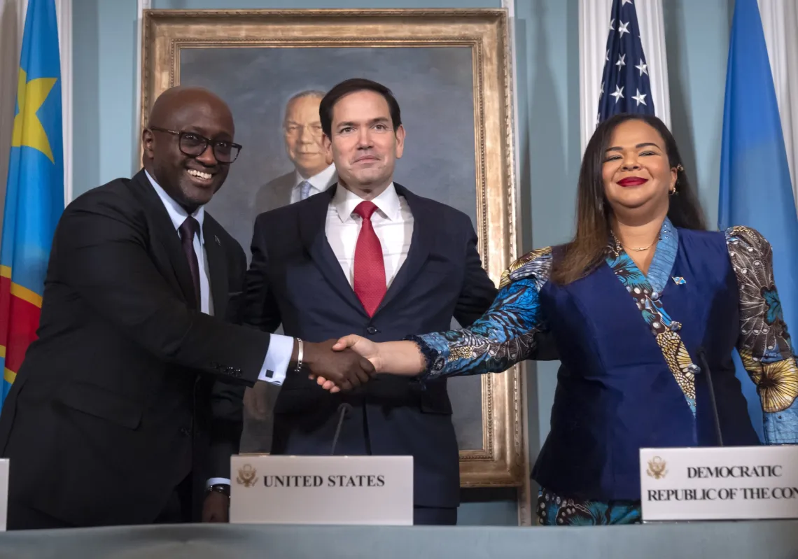 Secretary of State Marco Rubio stands with Rwanda's FM Olivier Nduhungirehe and Democratic Republic of Congo's FM Therese Kayikwamba Wagner, after signing a peace agreement in Washington on June 27, 2025.
