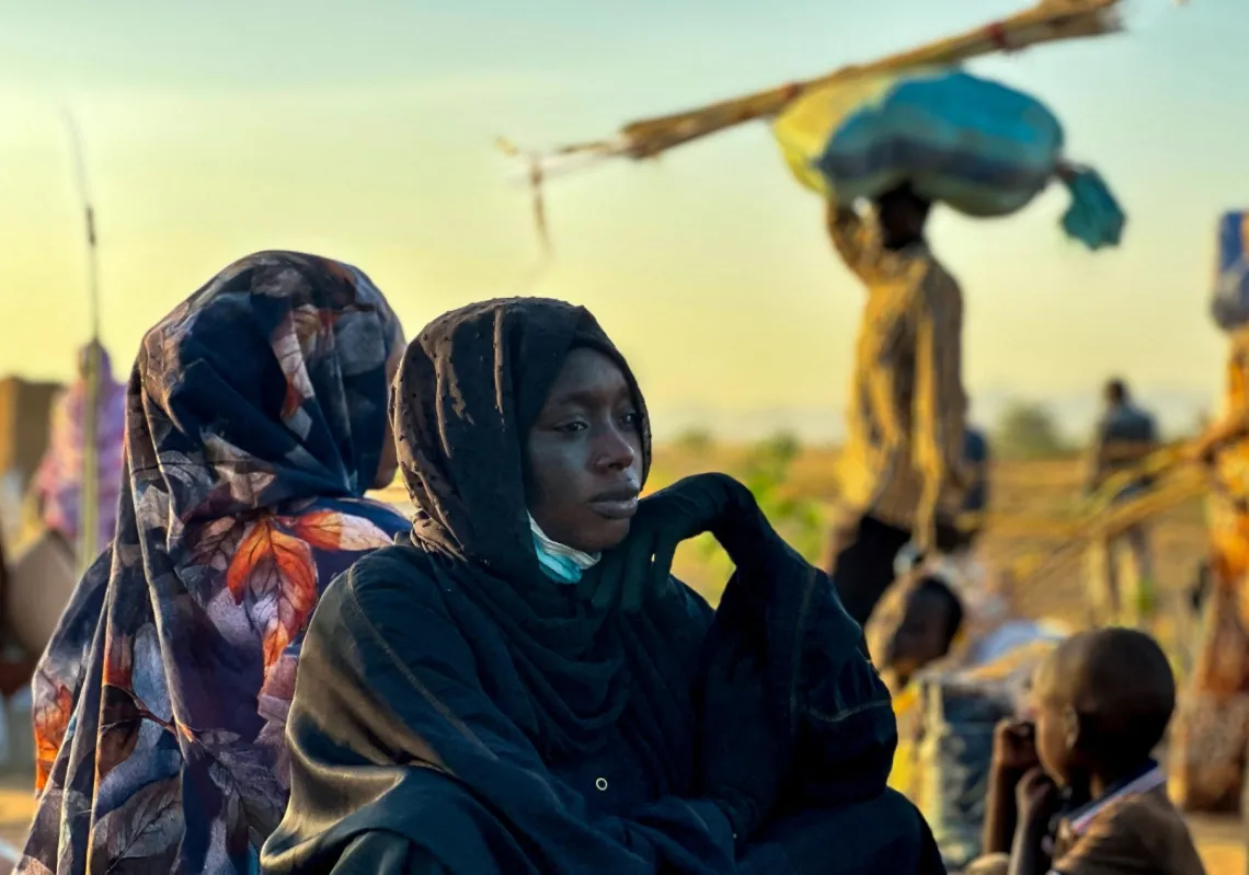 A displaced woman rests in Tawila, in the country's war-torn western Darfur region, on 28 October 2025, after fleeing el-Fasher following the city’s fall to the Rapid Support Forces (RSF).