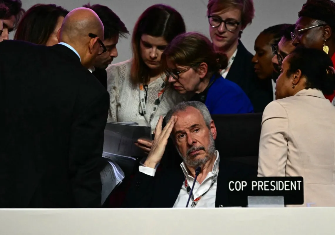 COP30 President Andre Correa do Lago gestures as the plenary session was interrupted following Colombia&#039;s  intervention at the COP30 UN Climate Change Conference in Belém, Pará state, Brazil, on 22 November 2025.