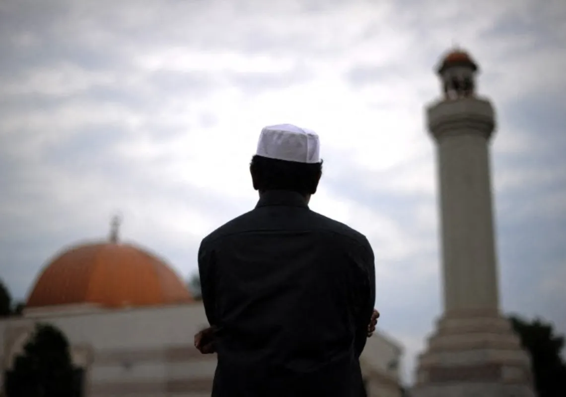 Picture for illustrative purposes only. A Muslim takes part in Eid-al-Fitr prayer marking the end of their holy fasting month of Ramadan, at a mosque in Silver Spring, Maryland, on 19 August, 2012.