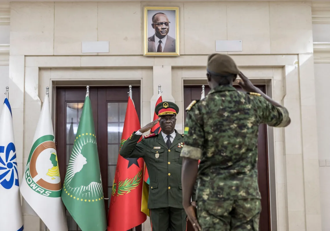 Transitional government President General Horta N'Tam salutes an army officer during the swearing in ceremony at the Presidential Palace in Bissau, on 28 November 2025. 
