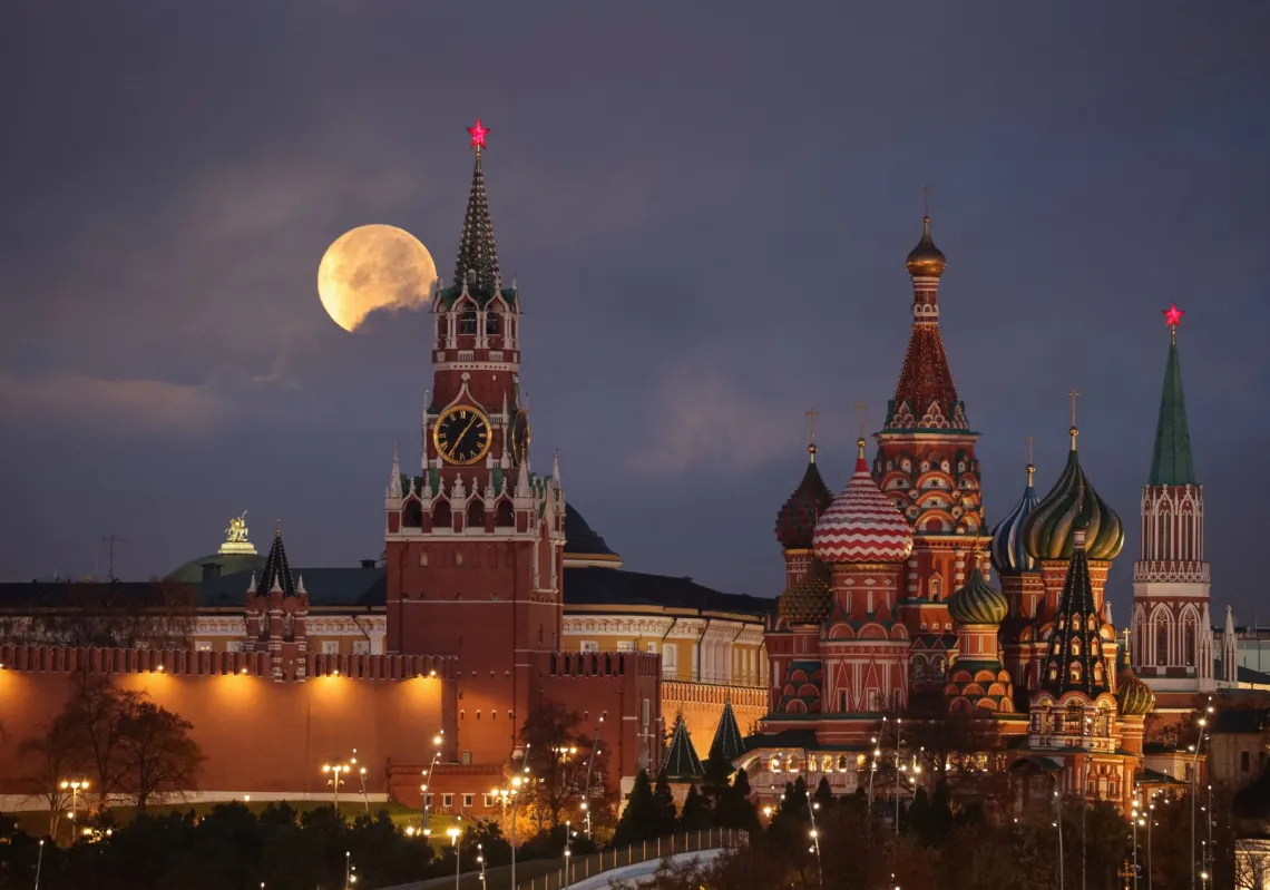 The Beaver Moon, a type of supermoon, sets behind Kremlin and St. Basil's Cathedral in Moscow, Russia, on 5 November 2025. 