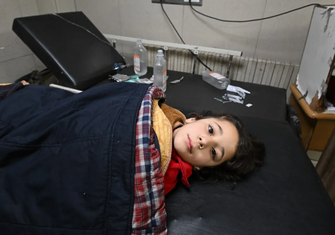 A wounded girl lies on a hospital bed after an Israeli strike in the Syrian village of Beit Jin on 28 November 2025 killed 10 people, the deadliest attack since al-Assad's ouster in December 2024.
