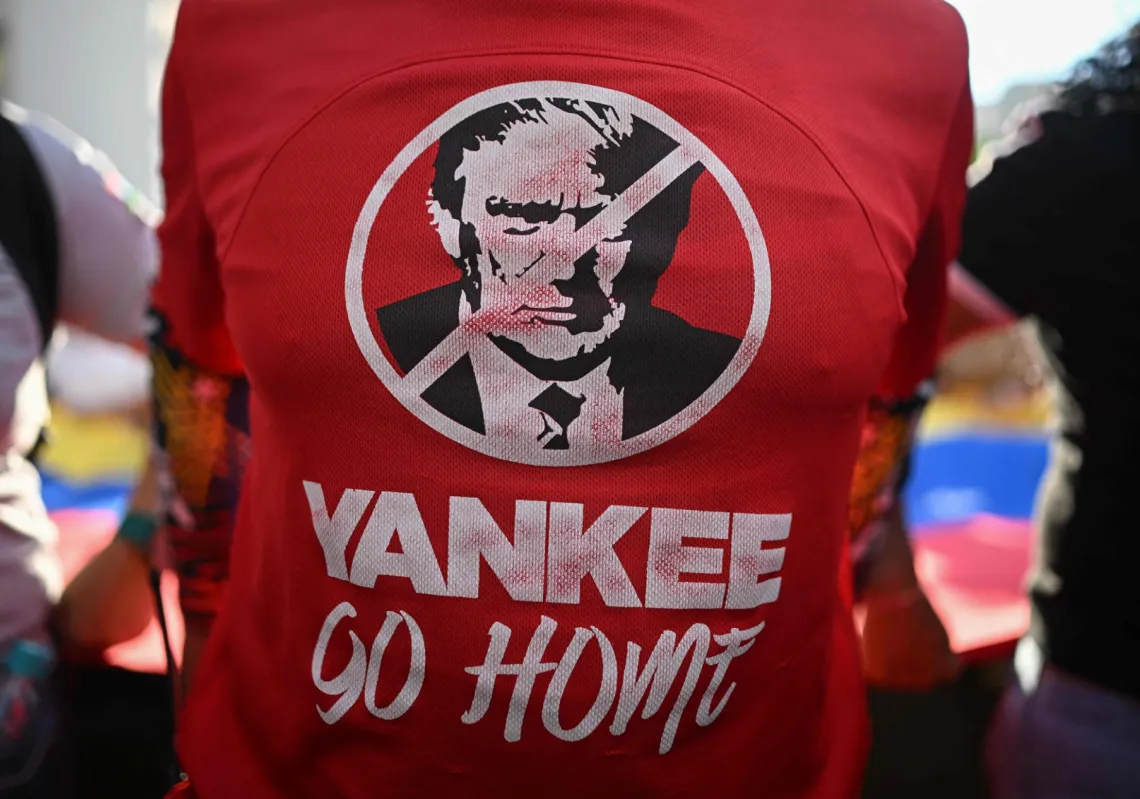A t-shirt worn by a supporter of Venezuelan President Nicolas Maduro during a rally against US military activity in the Caribbean, in Caracas on 30 October 2025.