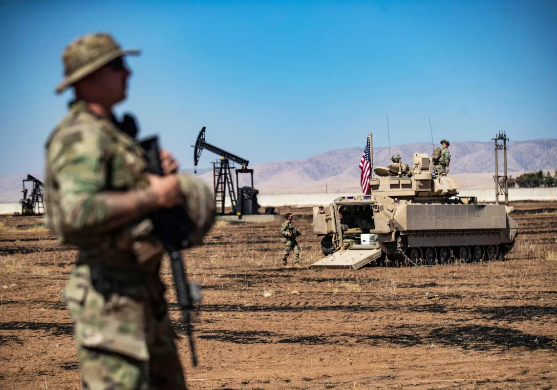 US forces patrol oil fields near Syria's north-east in the Qahtaniyah countryside of Hasakeh province on 3 September 2024.