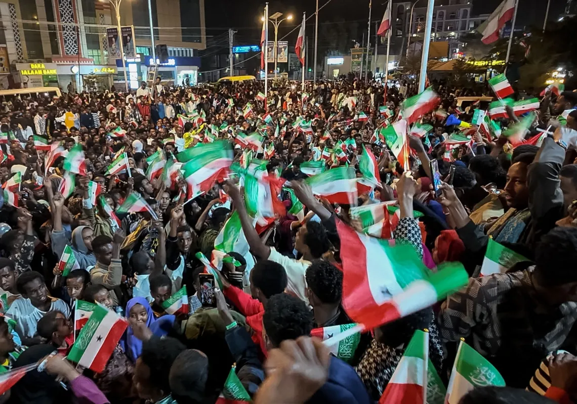 This aerial view shows residents waving Somaliland flags as they gather to celebrate Israel's announcement recognising Somaliland's statehood in downtown Hargeisa, on 26 December 2025. 