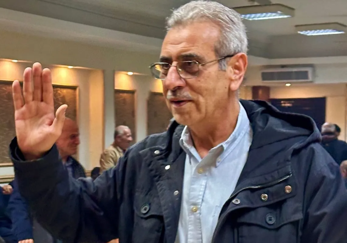 Ali Shaath, head of the Palestinian technocratic committee for managing the Gaza Strip, offers condolences to a Palestinian family in Cairo on 15 January 2026. 