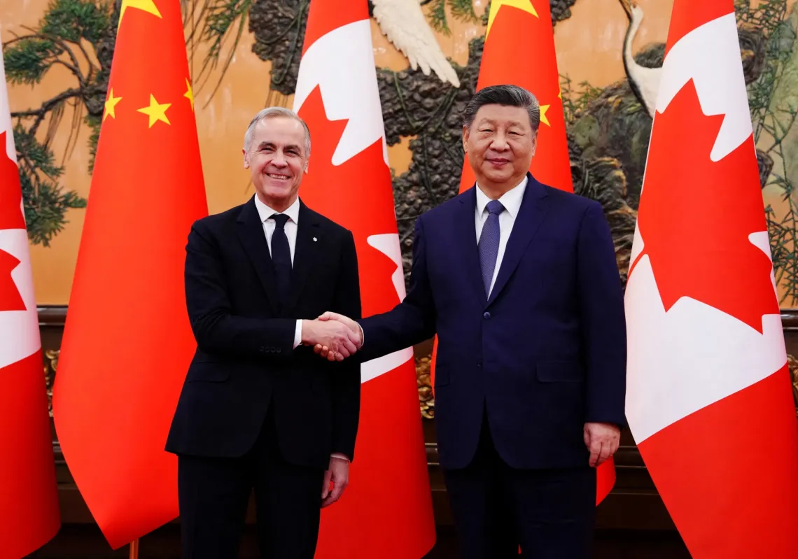 Canadian Prime Minister Mark Carney shakes hands with President of China Xi Jinping at the Great Hall of the People in Beijing, China, on Friday, 16 January 2026.