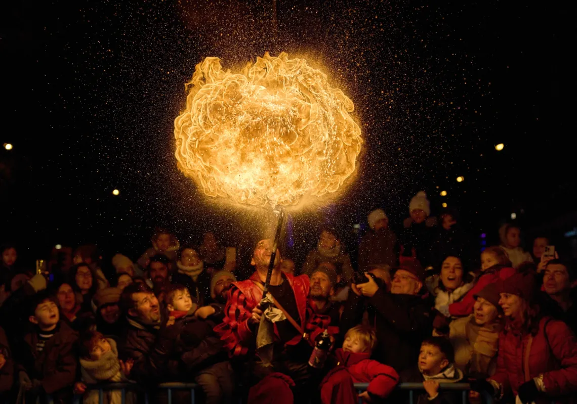 A fire eater performs during the traditional "Cabalgata de Reyes" parade in Madrid, Spain, on 5 January 2026, as part of the festivities marking the Catholic feast of Epiphany. 