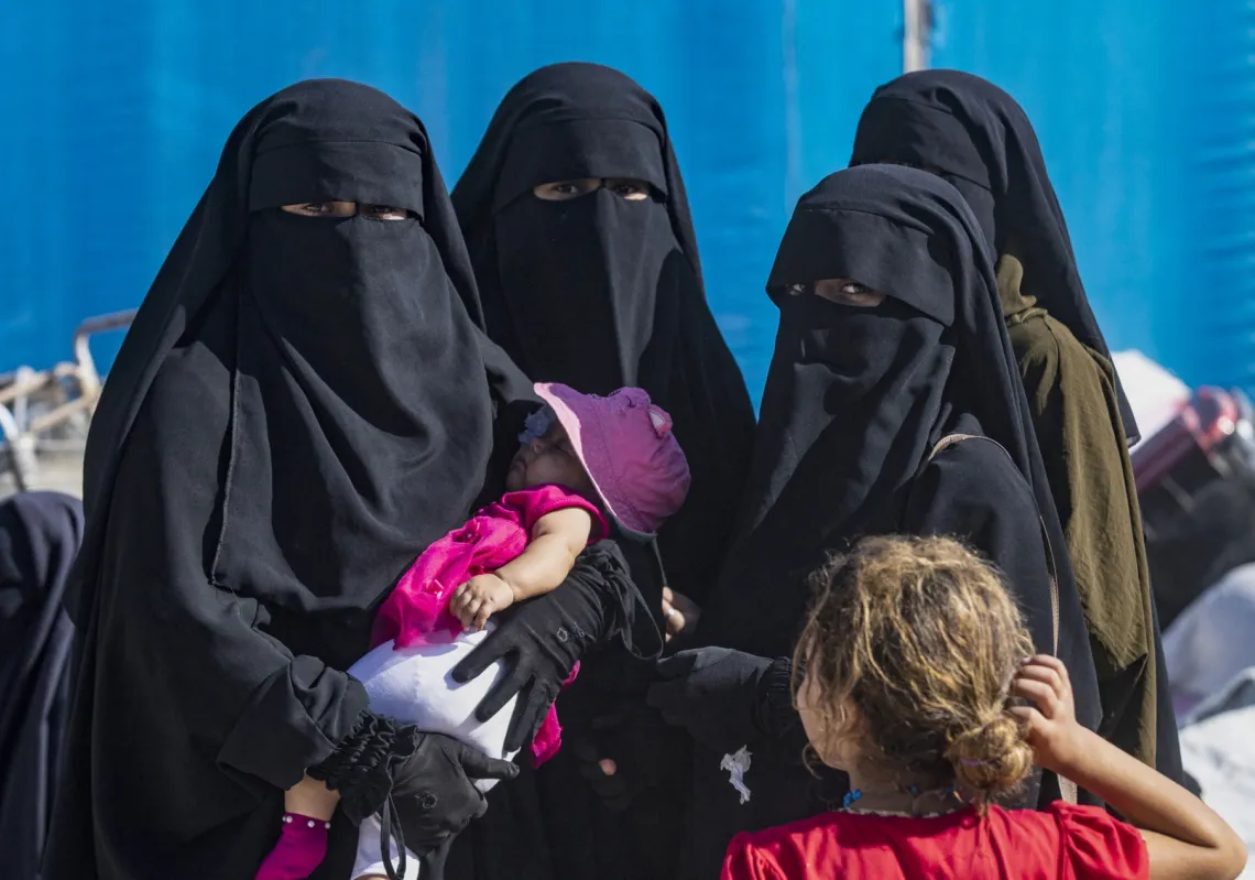 Released detainees prepare to leave the Kurdish-run al-Hol camp, which holds relatives of suspected Islamic State (IS) group fighters in Syria's northeastern Hasakeh governorate on 3 September 2023.