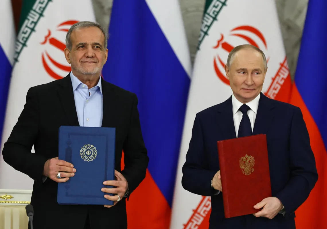 Russian President Vladimir Putin and his Iranian counterpart Masoud Pezeshkian after signing the association treaty in the Kremlin on 17 January 2025.