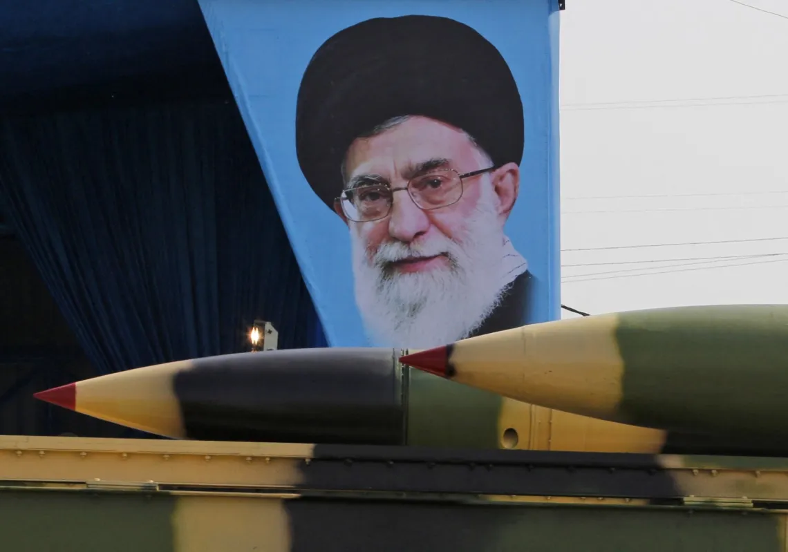 An Iranian military truck carries surface-to-air missiles past a portrait of Iran's Supreme Leader Ayatollah Ali Khamenei during a parade on the occasion of the country's annual army day on 18 April 2018, in Tehran.