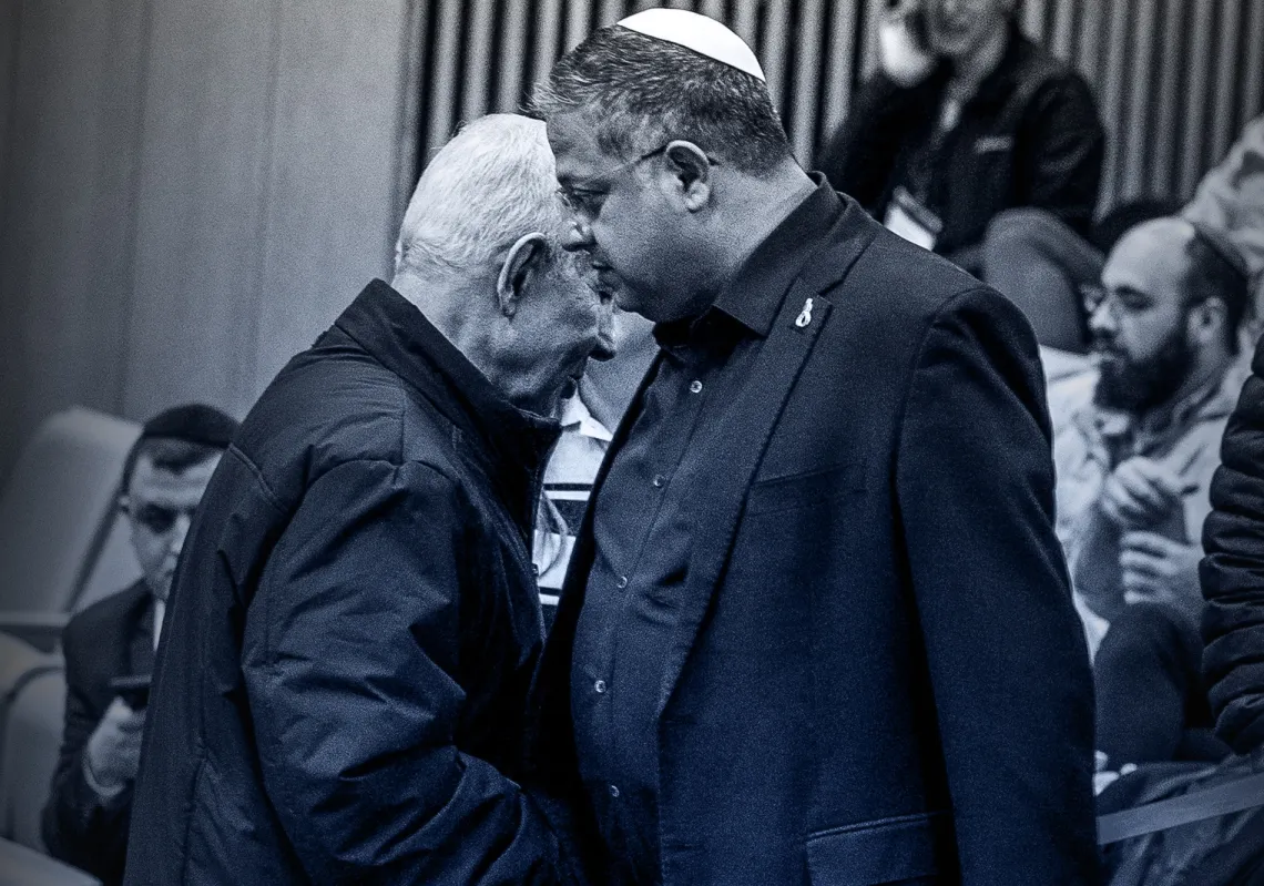 Israeli Prime Minister Benjamin Netanyahu and Israeli National Security Minister Itamar Ben-Gvir shake hands during a session at the Knesset in Jerusalem, on 29 March 2026.