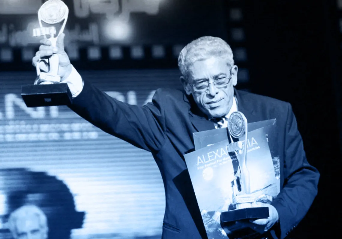 Egyptian director Daoud Abdel Sayed holds two awards during the opening ceremony of the Alexandria Film Festival for Mediterranean Countries in the Egyptian port city of Alexandria, late on 14 September 2010.