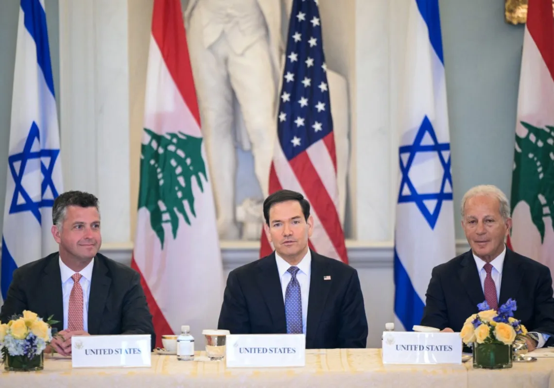 US Secretary of State Marco Rubio (C), alongside US State Department Counselor Michael Needham (L) and US Ambassador to Lebanon Michel Issa (R) at the State Department in Washington, DC, on 14 April 2026.