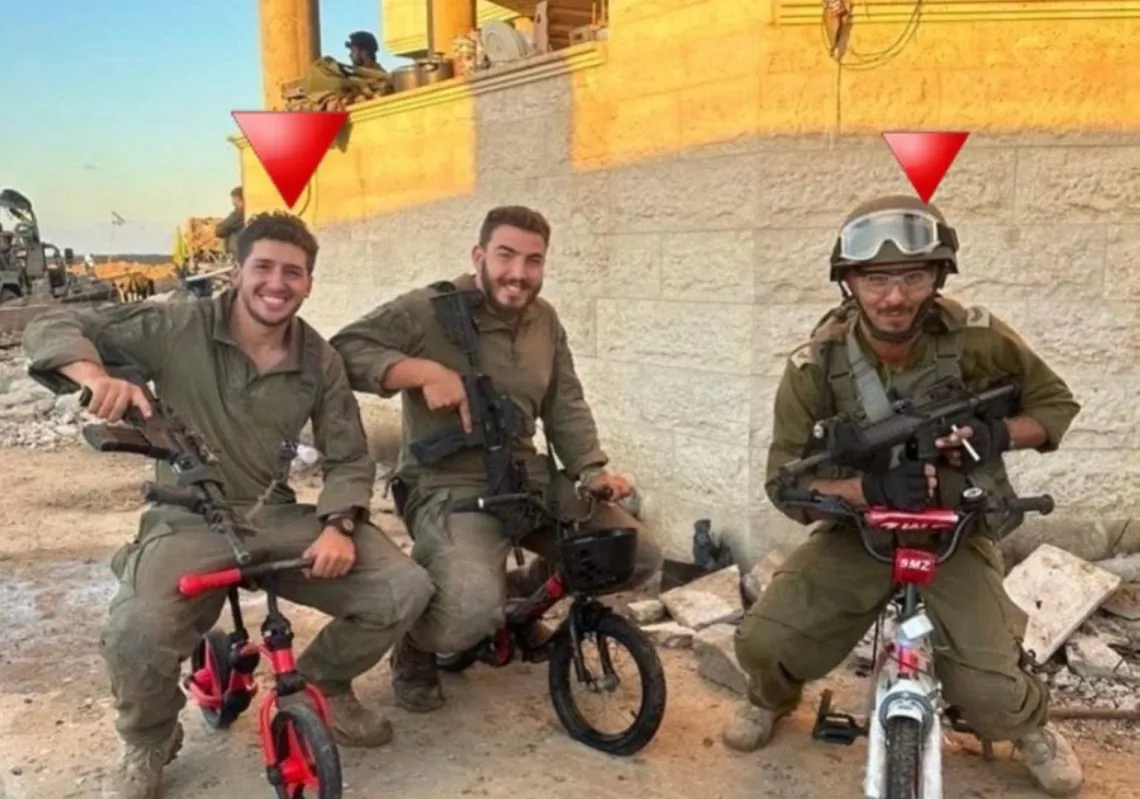 Israeli soldiers riding children's bikes in Gaza.