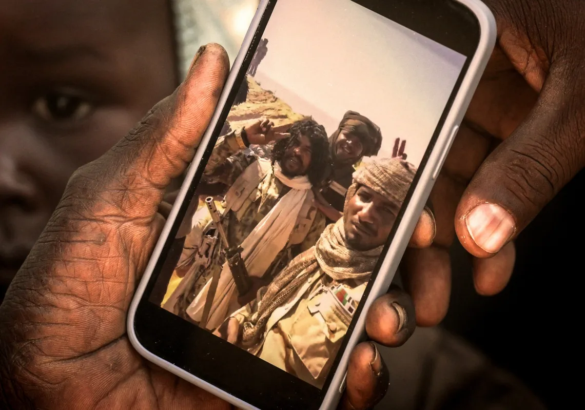 A Reuters reporter displays a video of RSF commander al-Fateh Abdullah Idris, known as Abu Lulu, on his phone.