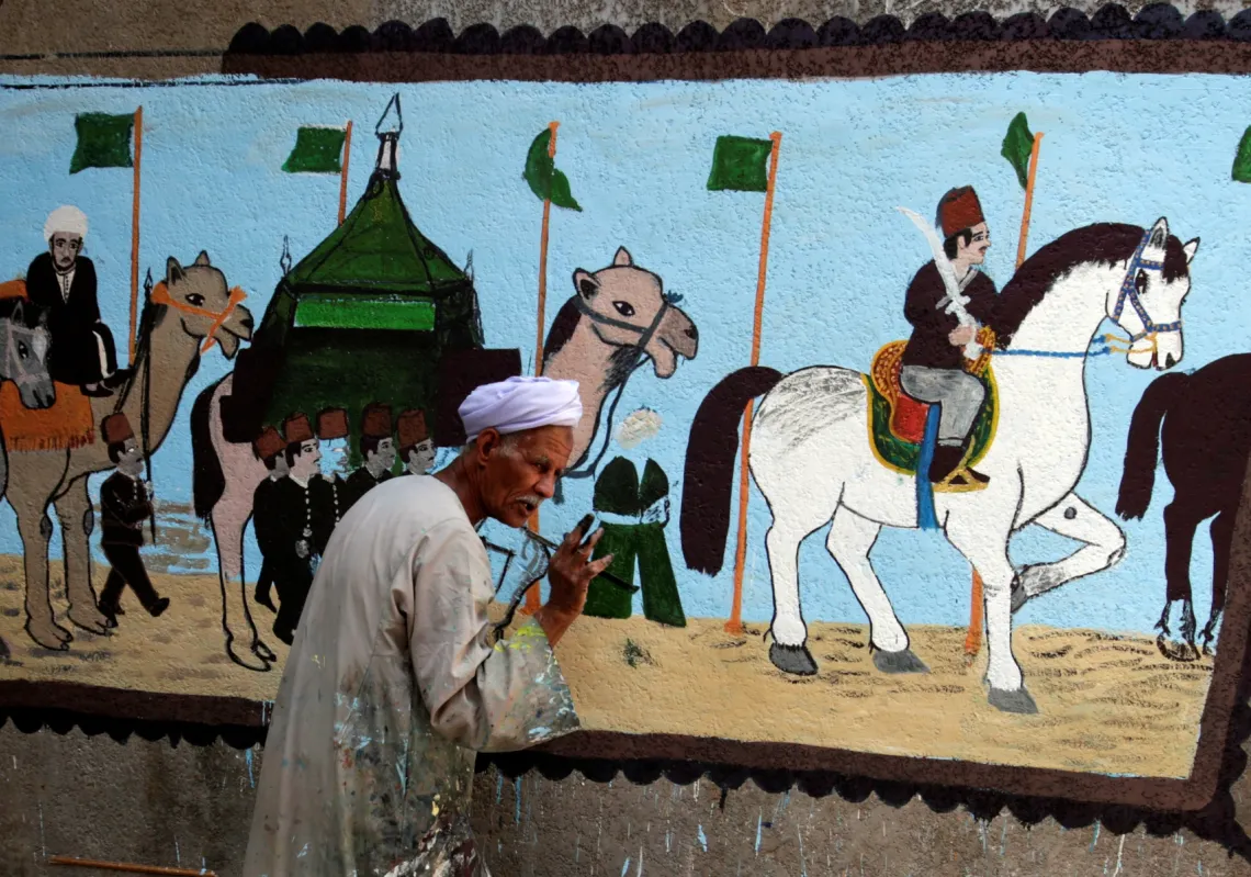 الفنان عيد الصلعاوي يرسم جداريات عن الكعبة ومناسك الحج في القاهرة، 2019