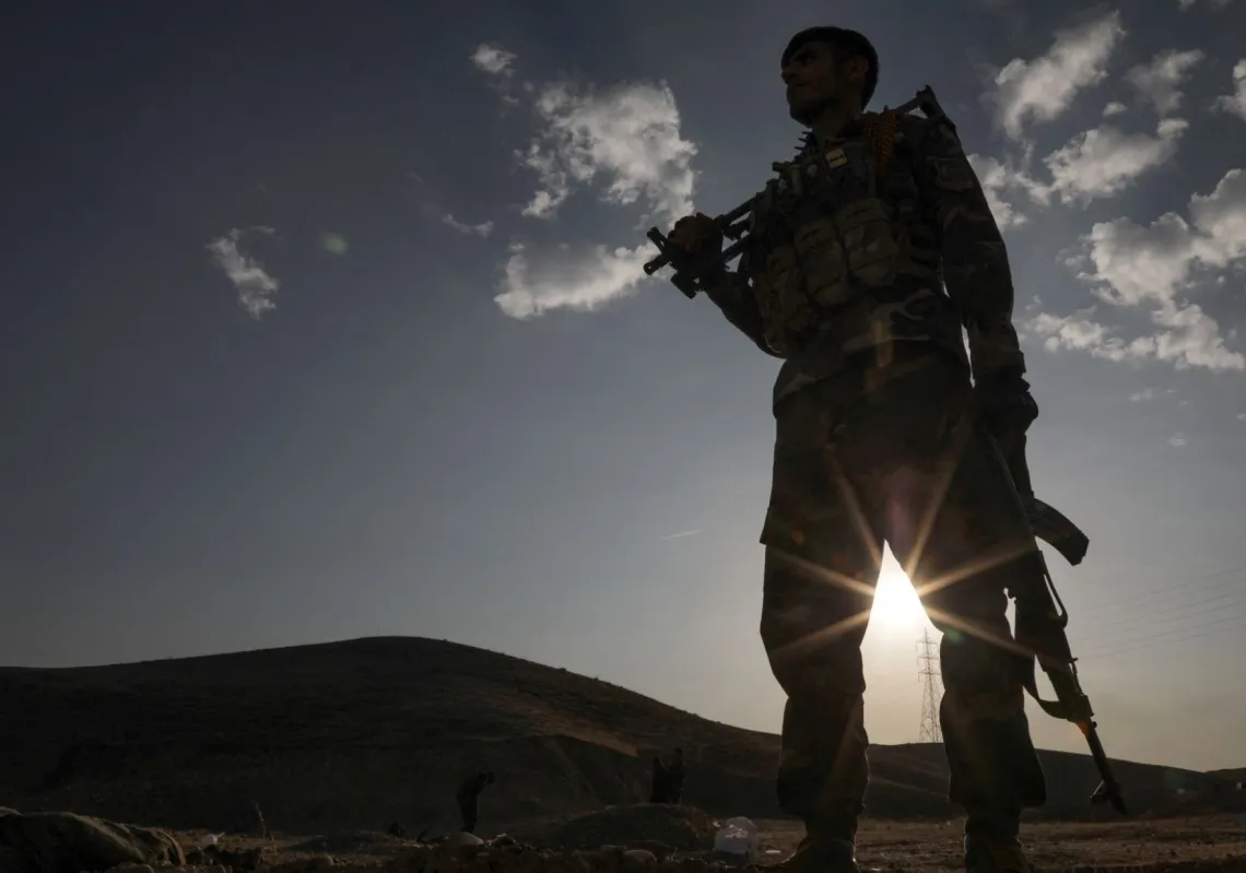 A Kurdish Peshmerga fighter affiliated with Iran's separatist Kurdistan Freedom Party (PAK), mans a position north of Kirkuk, in Iraq's autonomous Kurdistan region.