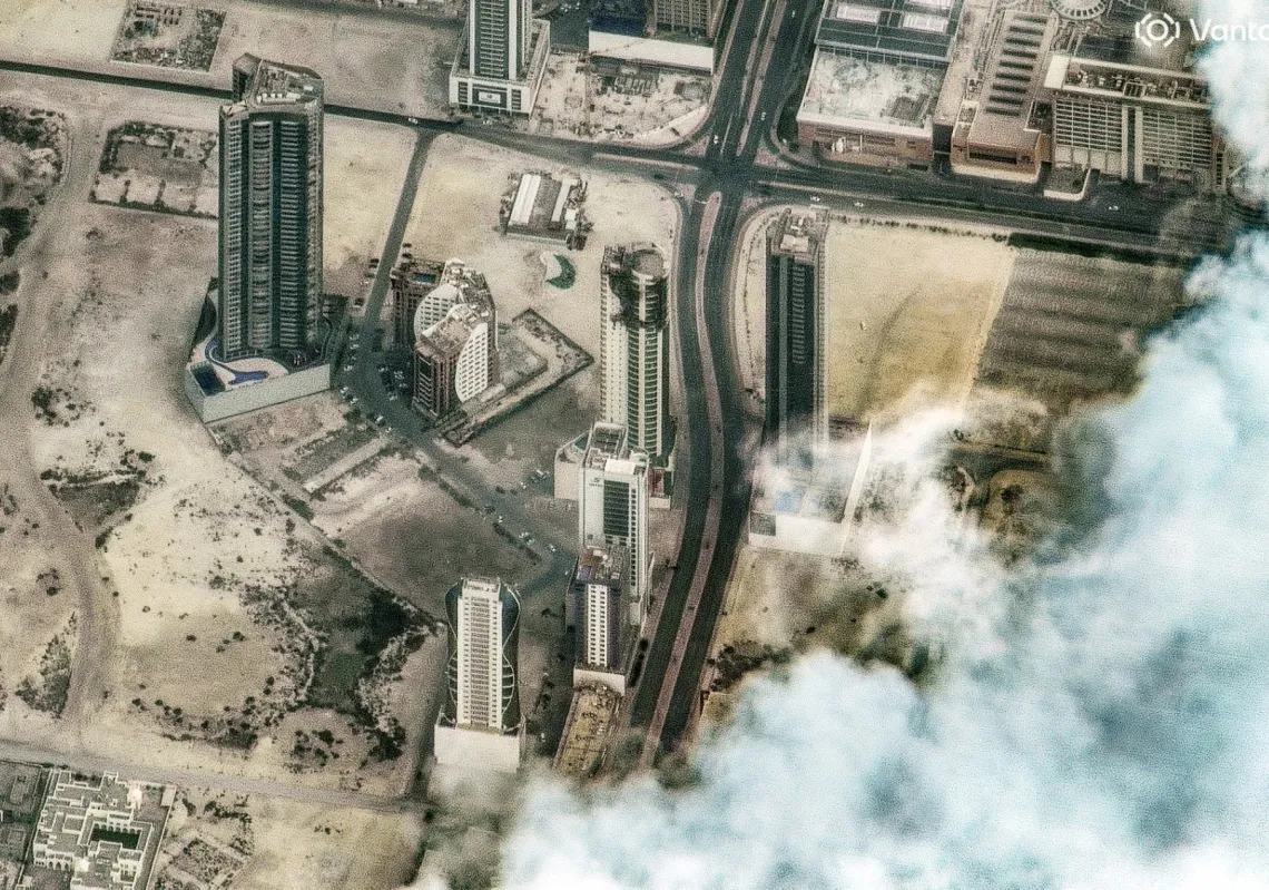 This handout satellite image, courtesy of Vantor, shows damage following a drone attack on a high-rise apartment building in Bahrain's capital Manama on 2 March 2026.