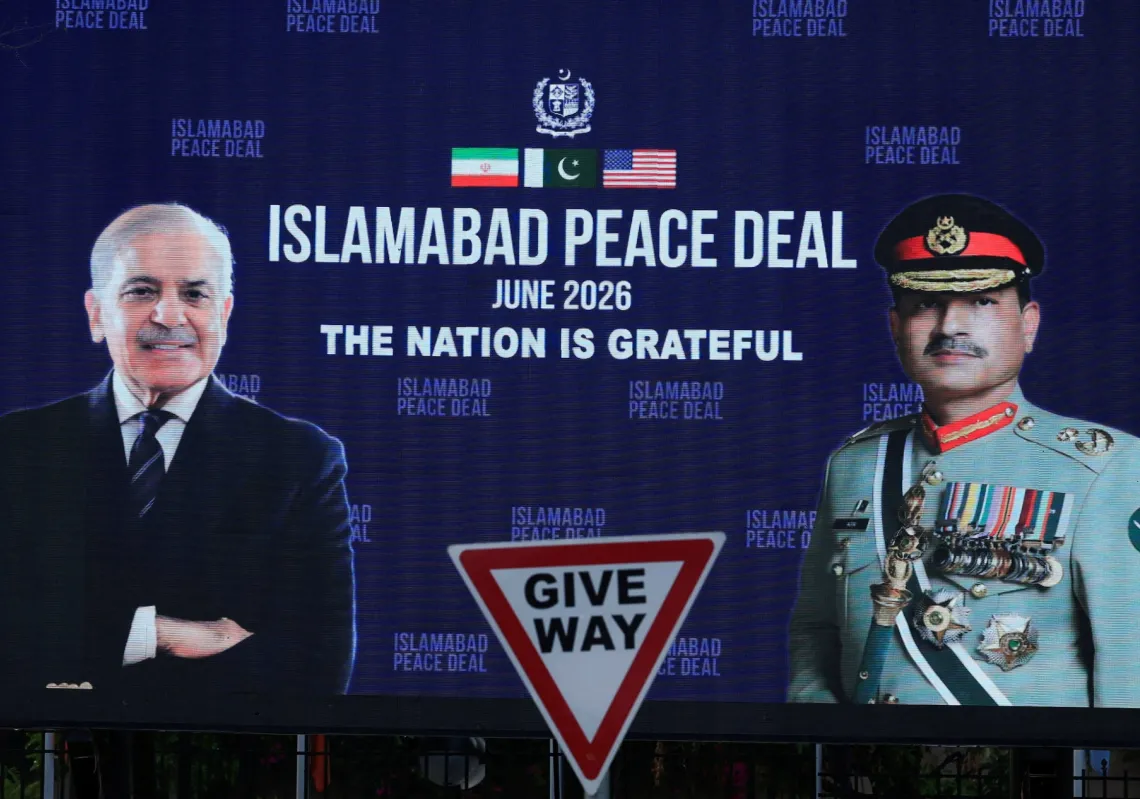 A roadside billboard displaying portraits of Pakistan's Chief of Army Staff Field Marshal Asim Munir and Prime Minister Shehbaz Sharif, following a deal between the US and Iran, in Islamabad, Pakistan, on 16 June 2026.