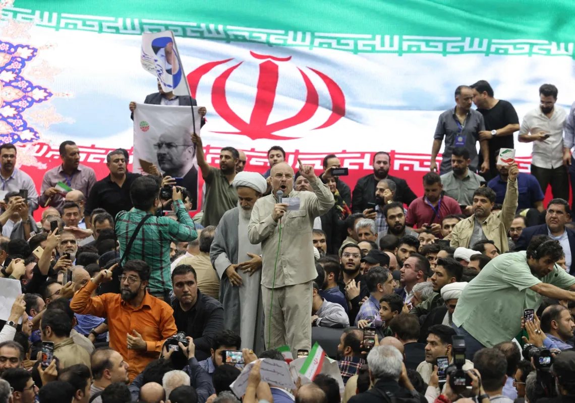 Iran's conservative Parliament Speaker Mohammad Bagher Ghalibaf addresses supporters in the Iranian capital, Tehran, on June 26, 2024, during his election campaign ahead of a presidential vote to replace the late president.