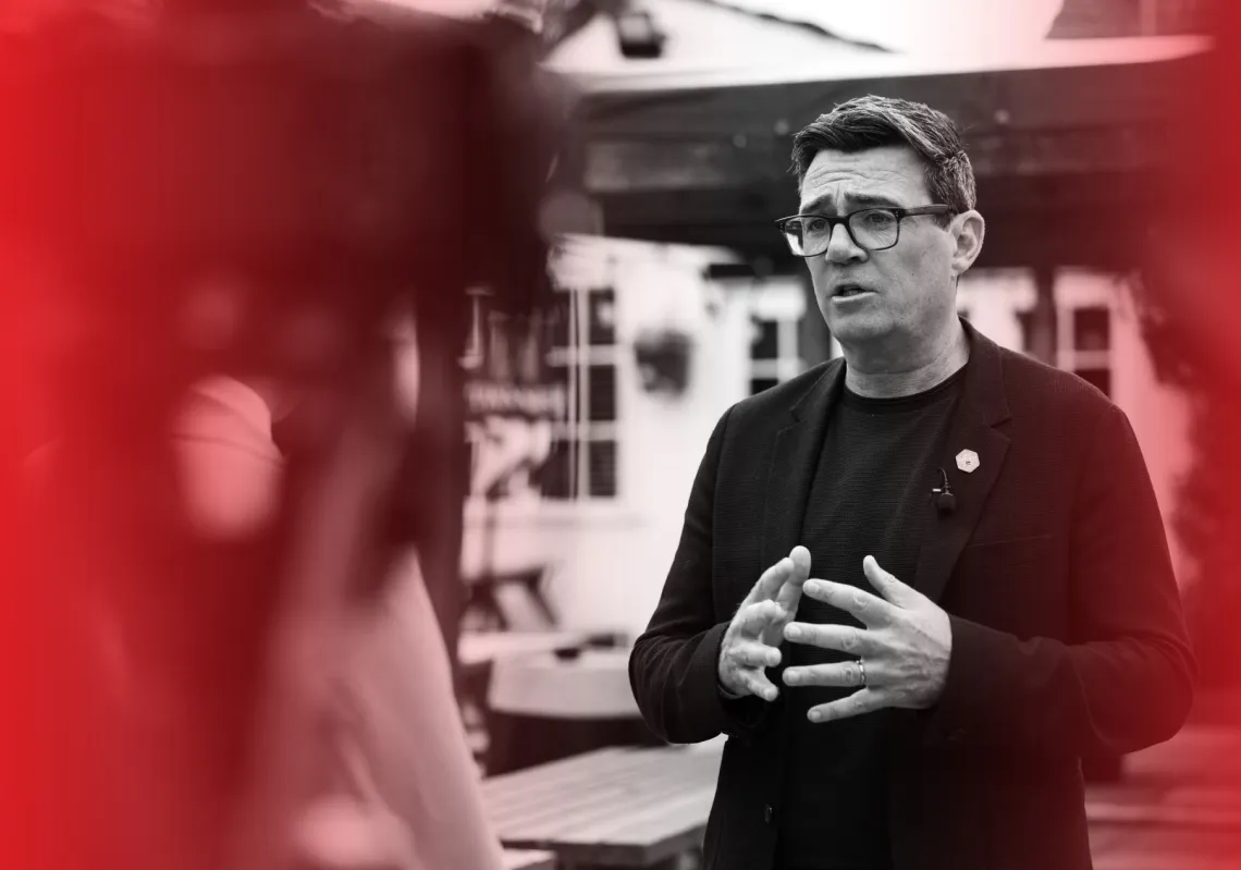 Greater Manchester Mayor and Labour candidate Andy Burnham speaks to the media outside a pub in Wigan ahead of the 18 June Makerfield by-election, in Wigan, Britain, on 5 June 2026. 
