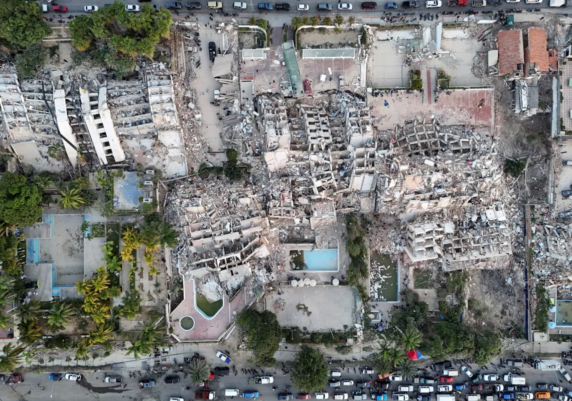 A drone view shows buildings destroyed by earthquakes in La Guaira, Venezuela, 26 June 2026. 