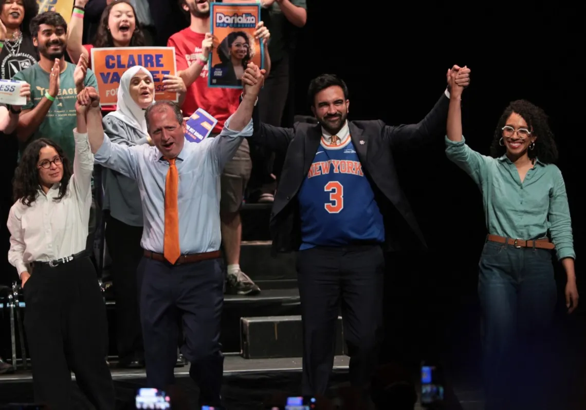 Congressional candidate Claire Valdez, Brad Lander, Darializa Avila Chevalier stand with New York Mayor Zohran Mamdani at a rally at King's Theatre on 18 June 2026 in New York City.