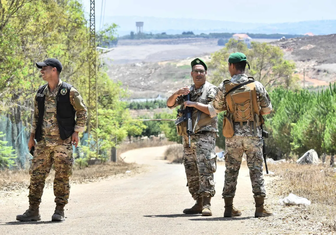 Lebanese soldiers stand on a road near the entrance to the southern village of Zawtar al-Garhbiya on July 21, 2026.