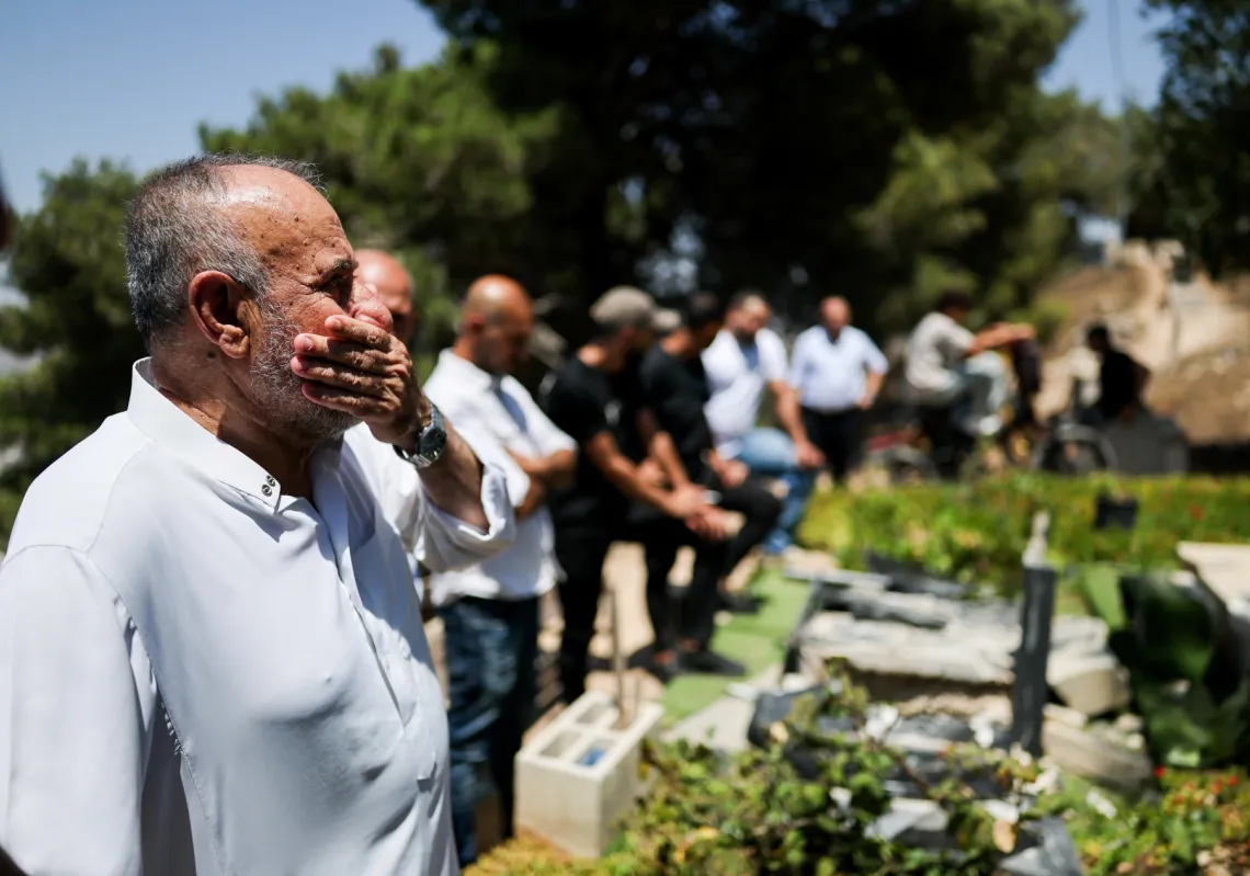 Mustafa Ali Abu Bakr, 76, stands in front of his family’s graves after they were broken by Israeli soldiers near Nablus in the Israeli-occupied West Bank, on 31 July 2026.