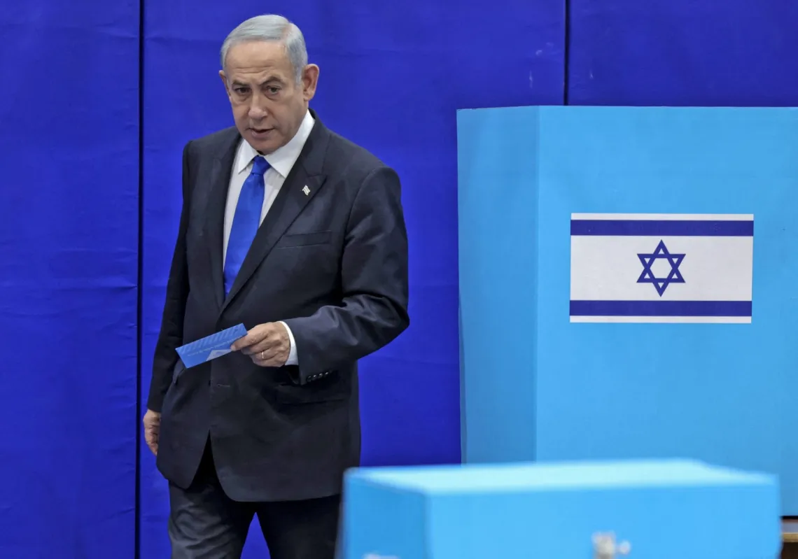 Likud chairman Benjamin Netanyahu casts his ballot at a polling station in Jerusalem in the country's fifth election in less than four years on 1 November 2022.