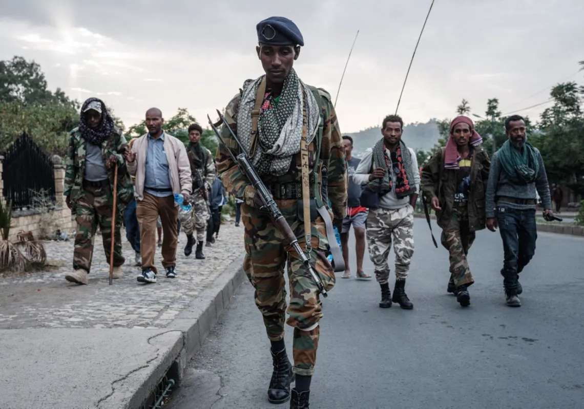  Tigray People's Liberation Front (TPLF) fighters arrive after eight hours of walking in Mekele, the capital of the Tigray region, Ethiopia, on 29 June 2021. 