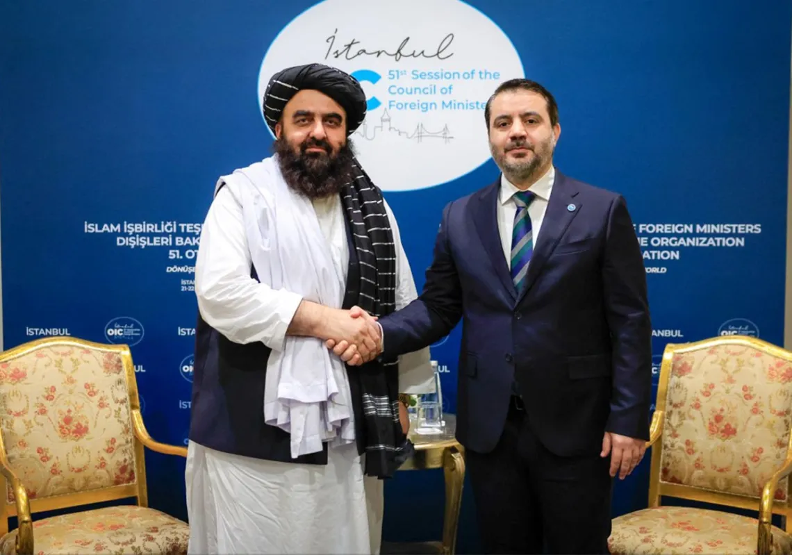 Syria's foreign minister, Asaad al-Shaibani, meets with Taliban foreign minister, Amir Khan Muttaqi, on the sidelines of an OIC meeting in Istanbul on 21 June 2025.