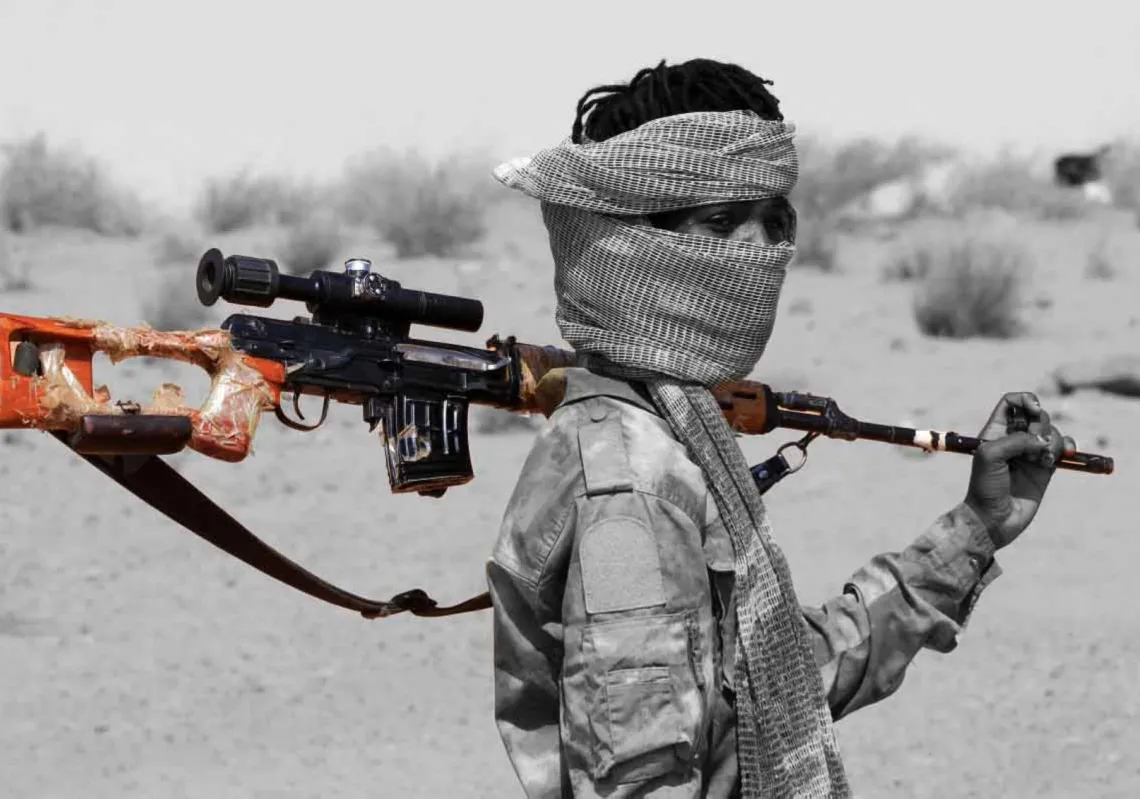 An armed defector from the paramilitary Rapid Support Forces (RSF) arrives, believed to be surrendering to the Sudanese military, in the west of Omdurman on 19 August 2026.