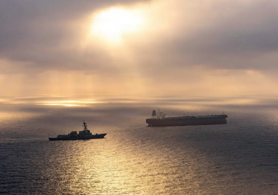 The USS Rafael Peralta implements a maritime blockade against the Iran-flagged crude oil tanker vessel Herby while the latter was attempting to sail toward an Iranian port on 24 April 2026.