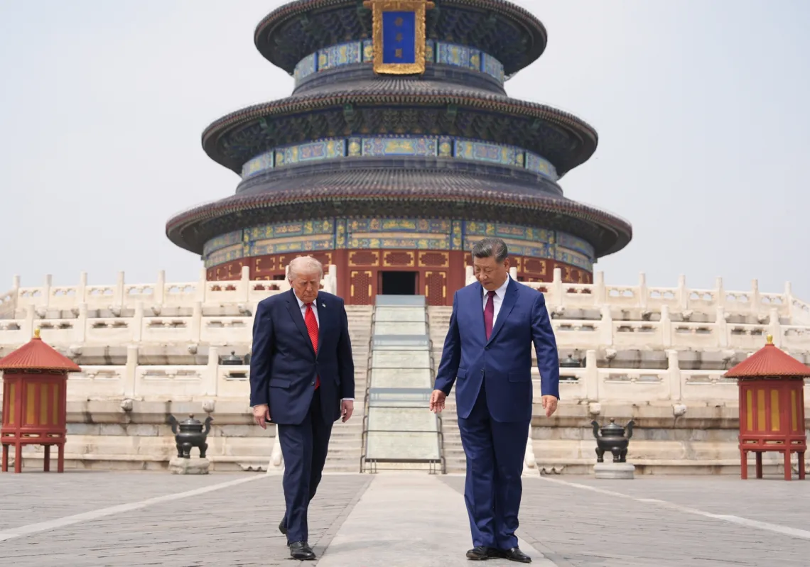 Donald Trump walks alongside Xi Jinping at the Temple of Heaven in Beijing, on 14 May 2026.
 