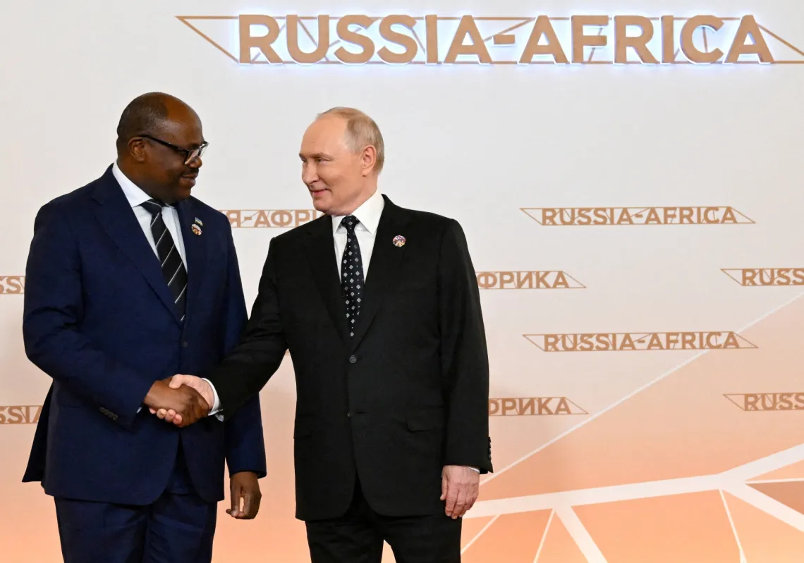 Russian President Vladimir Putin greets Rwanda's Prime Minister Justin Nsengiyumva during a welcoming ceremony for participants of the Russia-Africa Summit in Moscow, Russia, on 28 October 2026.